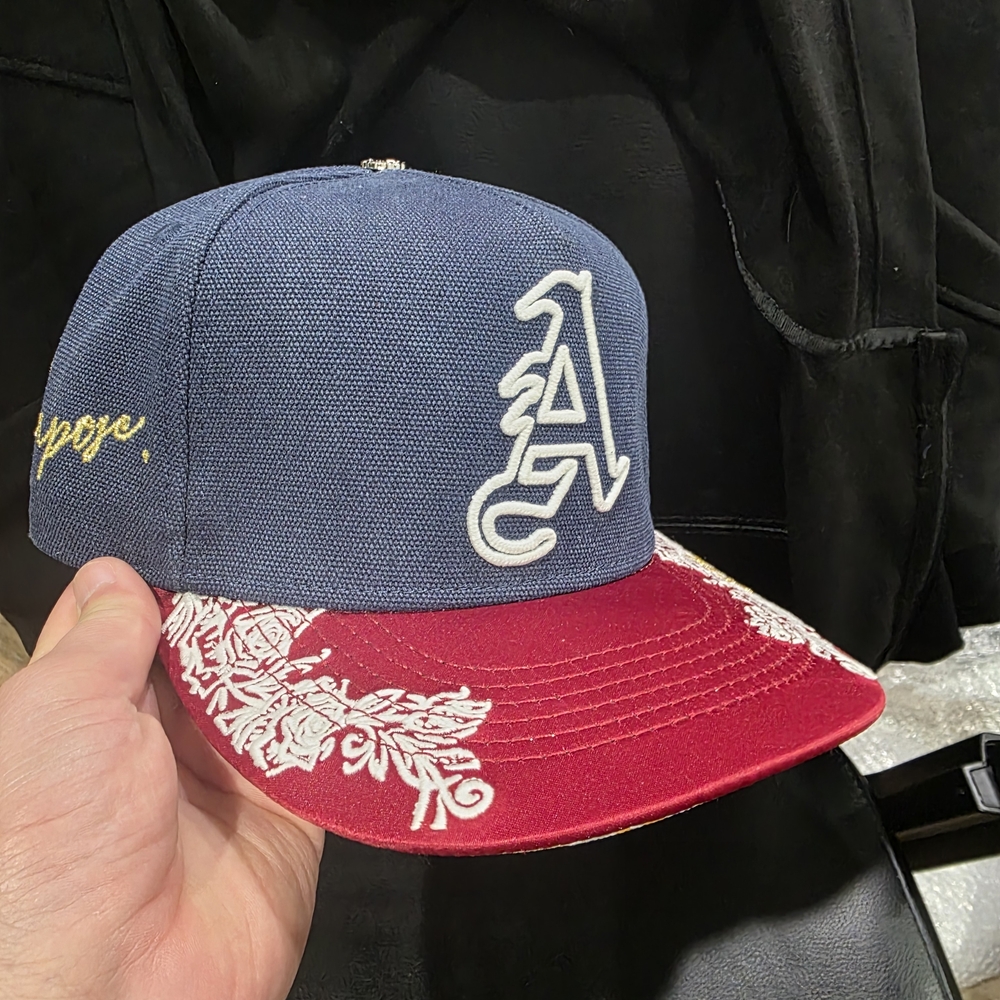 Blue and Red Cap with White Embroidery